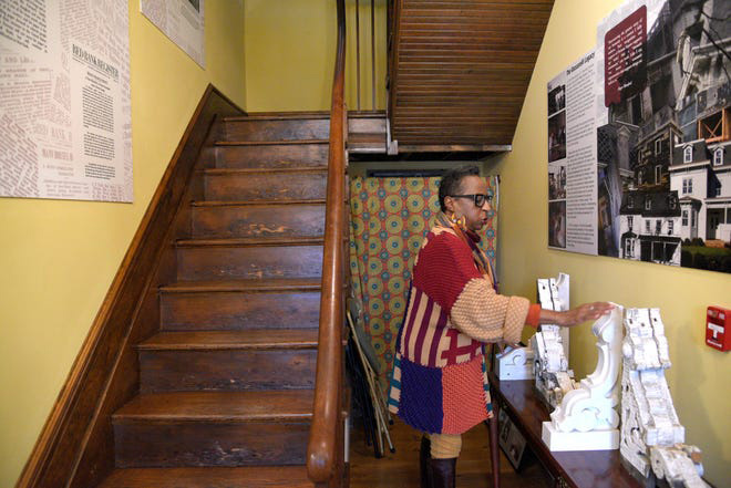 Gilda Rogers, executive director for the T. Thomas Fortune Center, explains the restoration process of the center on Saturday, Jan. 15, 2022 in Red Bank.